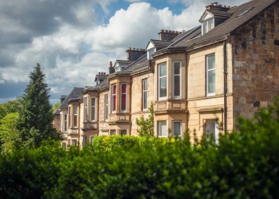 Row of residential houses, market shows strong momentum.